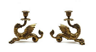 Lot 44 - A pair of brass candlesticks