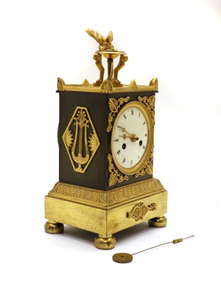 Lot 182 - A small French sized ormolu and bronze mounted clock