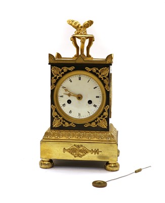 Lot 182 - A small French sized ormolu and bronze mounted clock