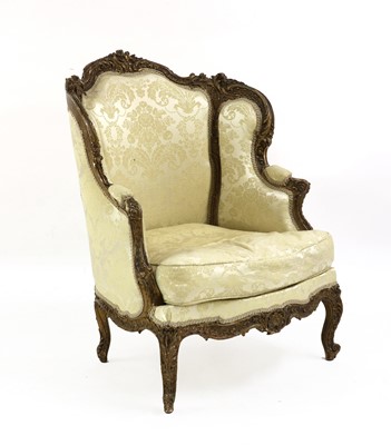 Lot 650 - A fine late 19th century carved giltwood rococo style chair