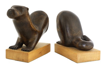 Lot 324 - A pair of contemporary carved bookends