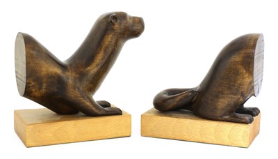 Lot 324 - A pair of contemporary carved bookends
