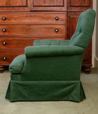 Lot 418 - A green button upholstered armchair