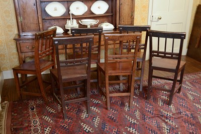 Lot 216 - A set of six George III oak dining chairs