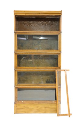 Lot 631 - An early 20th century Globe Wernicke style oak five section bookcase