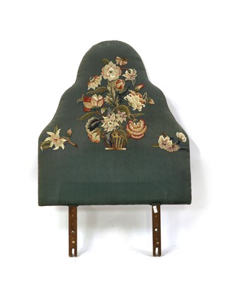 Lot 313 - A bed headboard with raised coloured embroidered flowers