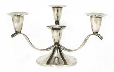 Lot 199 - A silver four-branch candelabra