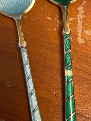 Lot 471 - A set of six silver-gilt and enamel coffee spoons