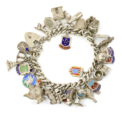 Lot 252 - A silver charm bracelet