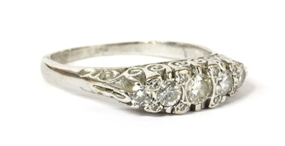 Lot 118 - An 18ct white gold five stone diamond ring