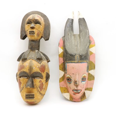 Lot 84 - Two painted and carved tribal masks