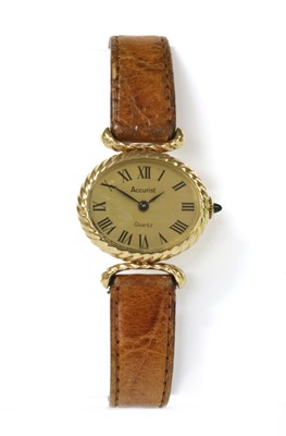Lot 309 - A ladies' gold Accurist quartz strap watch