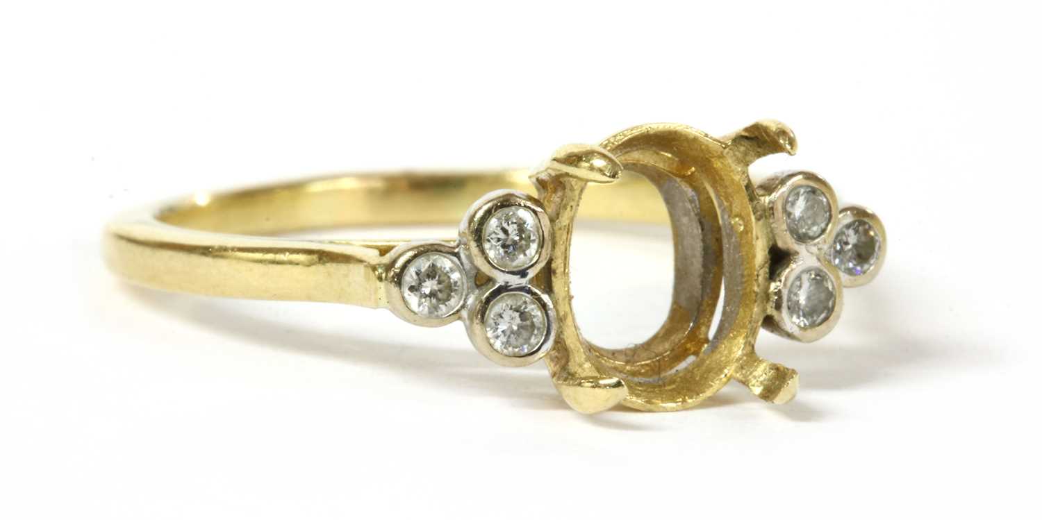 Lot 238 - A gold vacant ring mount with diamond shoulders