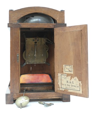 Lot 11 - A secessionist oak mantel clock
