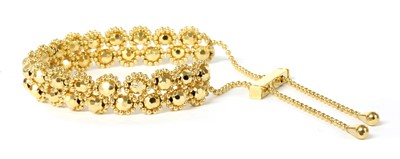 Lot 84 - A 9ct gold bead link bracelet