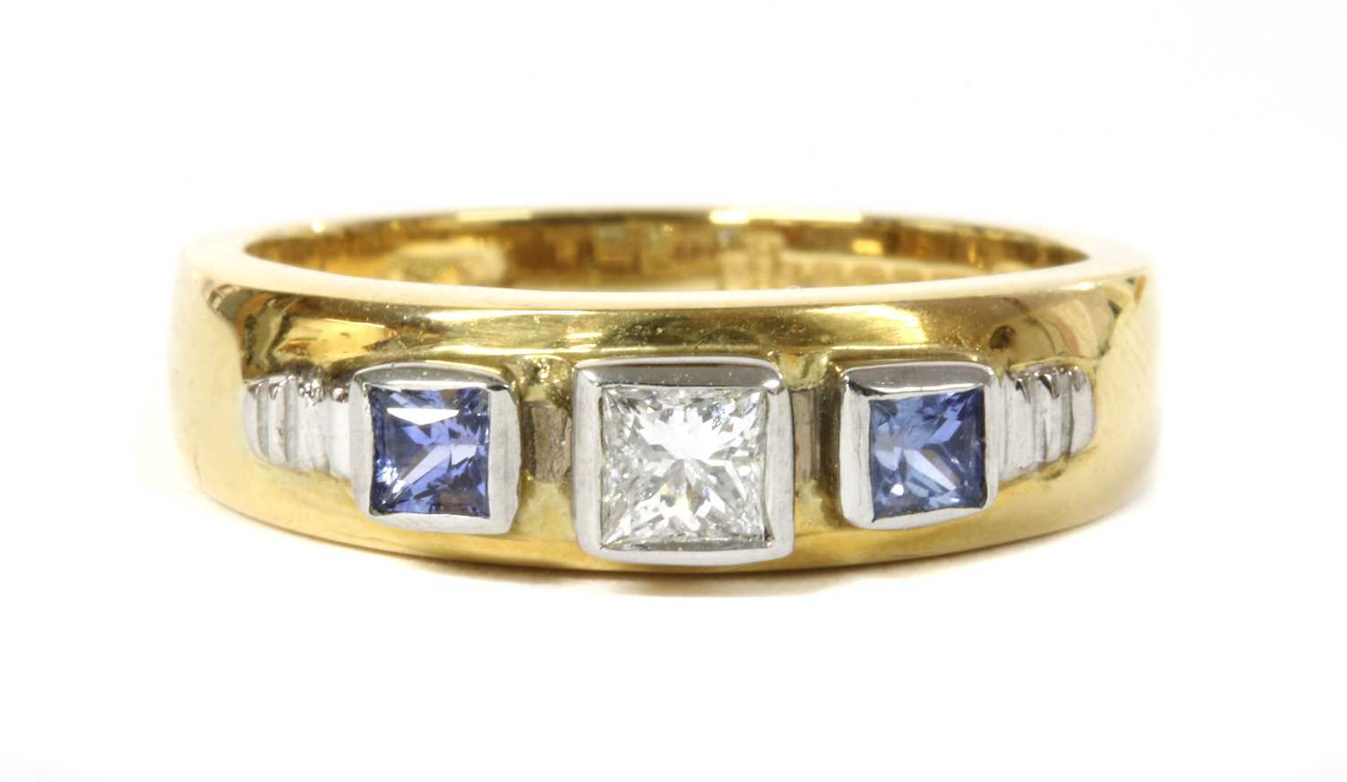 Lot 171 - An 18ct gold diamond and tanzanite ring, by Clogau