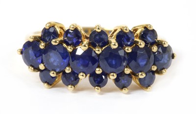 Lot 166 - A 9ct gold three row sapphire ring