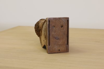 Lot 422 - A carved wooden hurdy-gurdy stock head