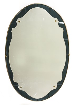 Lot 575 - A large Italian oval wall mirror