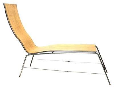 Lot 381 - A laminated wood chaise lounge
