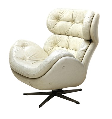 Lot 380 - A white leather armchair
