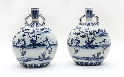 Lot 139 - Two pairs of Chinese blue and white moon flasks