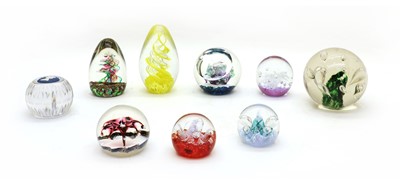 Lot 39 - A collection of glass paperweights and dump weights