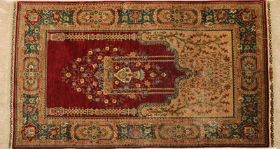 Lot 260 - A Turkish Hereke silk rug