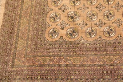 Lot 518 - A large Afghan carpet