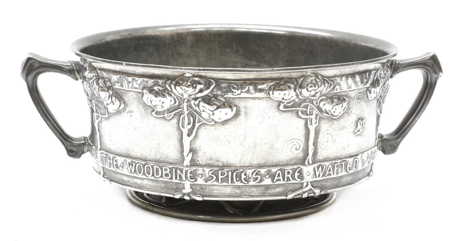 Lot 75 - A Tudric pewter twin-handled bowl