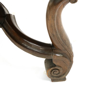 Lot 396 - A pair of carved walnut elbow chairs
