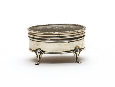 Lot 9 - An Edwardian silver tortoiseshell trinket box