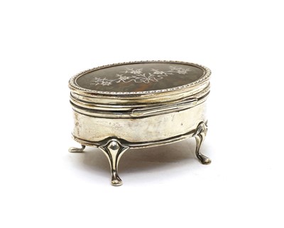 Lot 9 - An Edwardian silver tortoiseshell trinket box