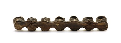 Lot 108 - A pipe rack in the form of seven monks heads