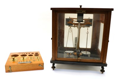 Lot 236 - A mahogany cased set of Oertling chemical balance scales
