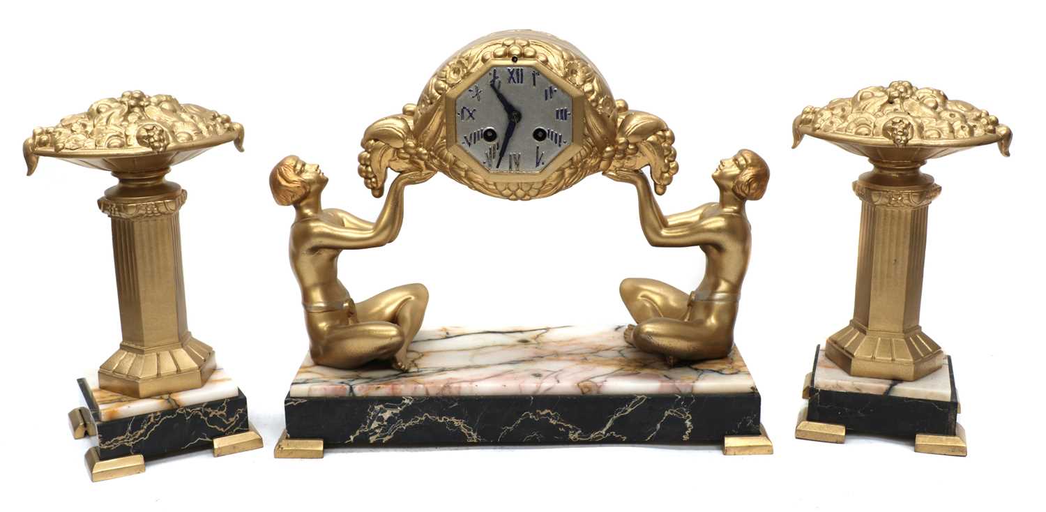 Lot 237 - A French marble and painted spelter clock garniture
