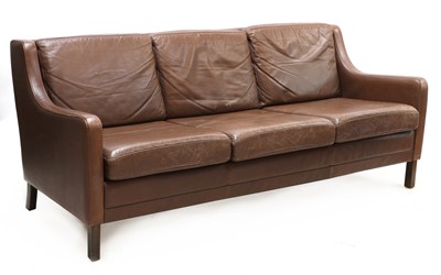 Lot 479 - A Danish chocolate leather three-seater settee
