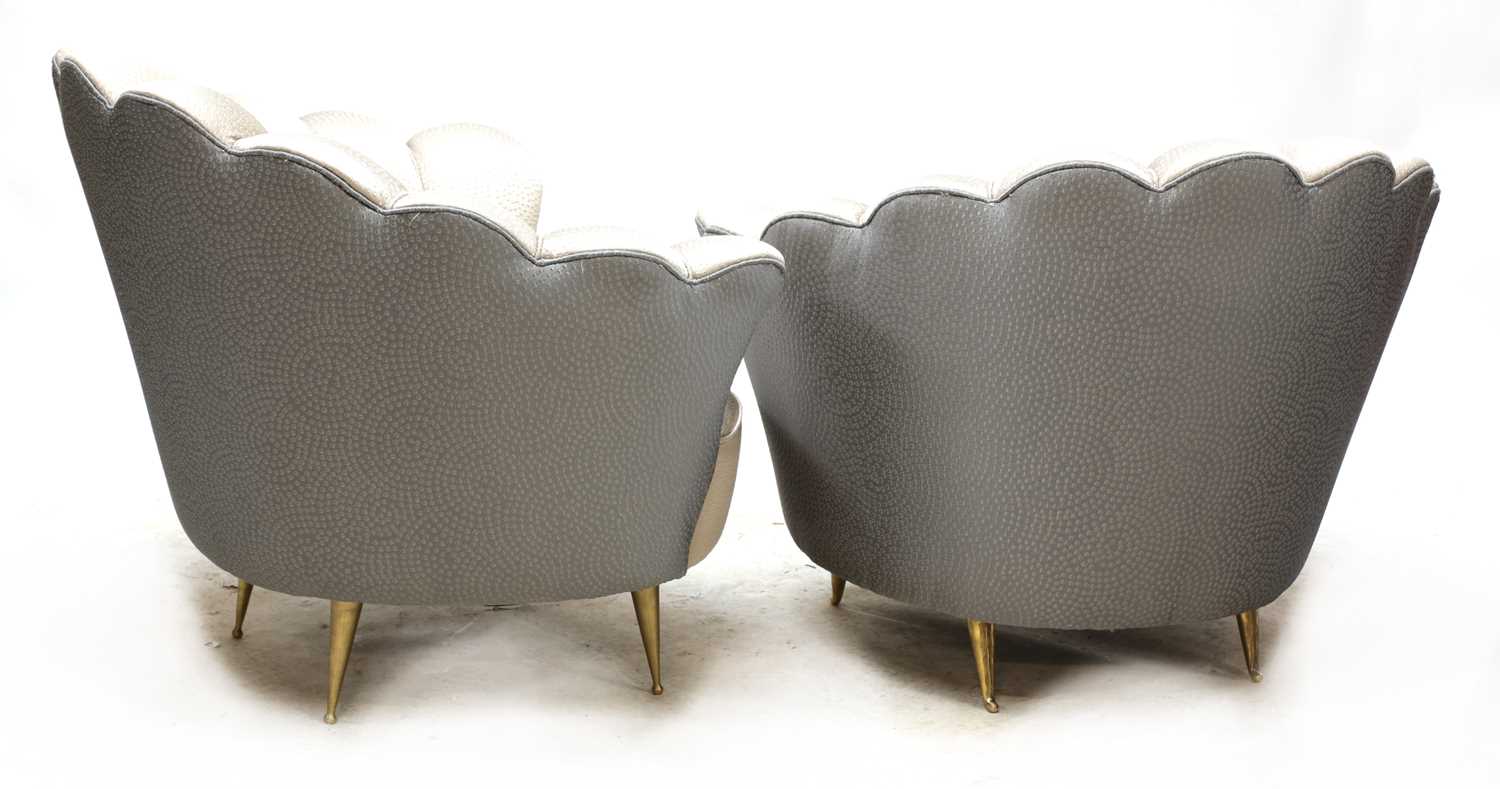 Lot 602 - A pair of Italian shell-shaped lounge chairs,