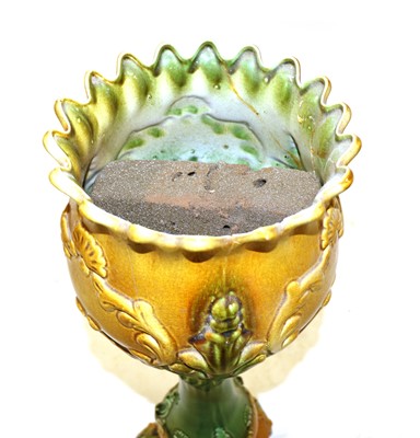 Lot 121 - A Victorian majolica jardiniere and stand