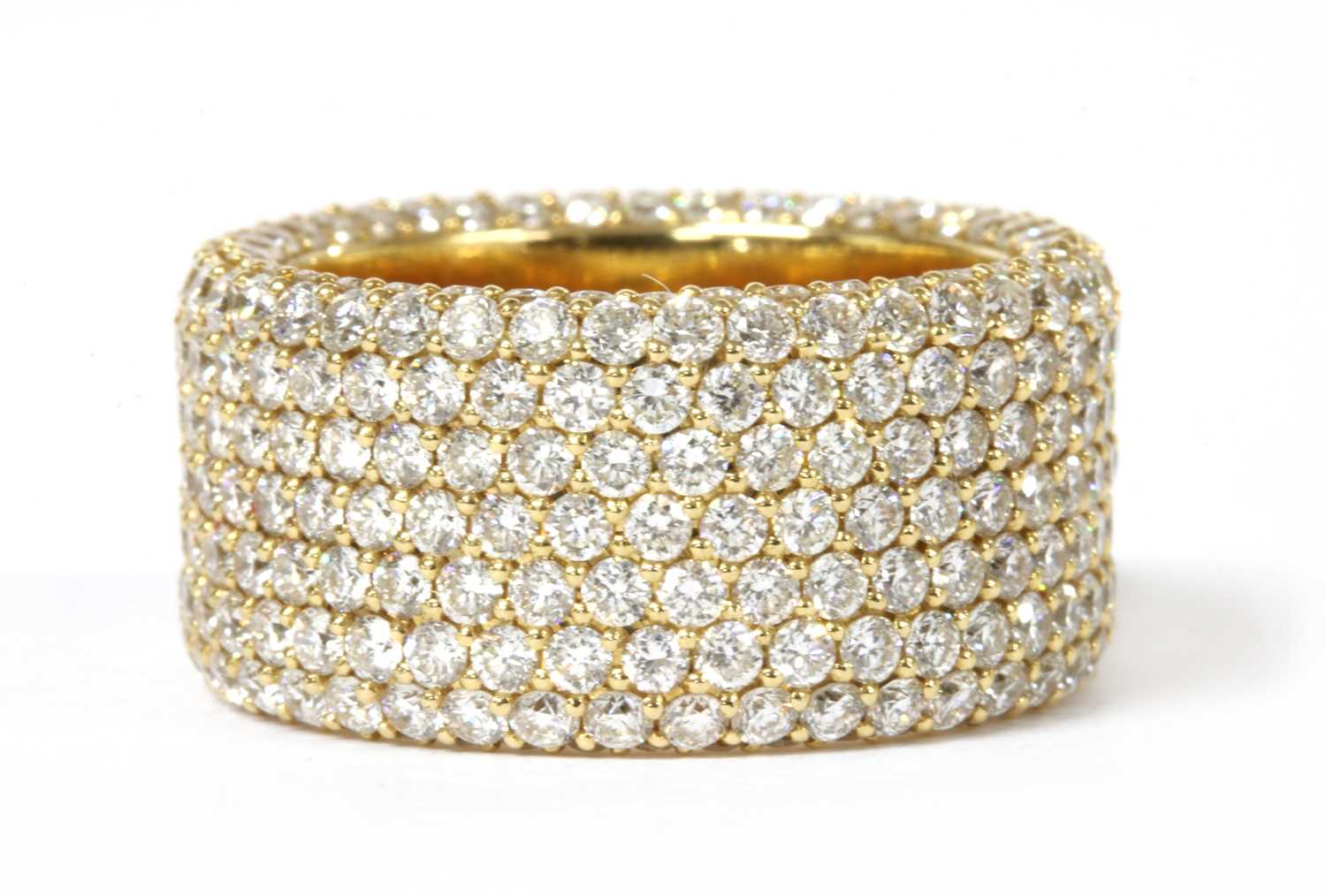 Lot 96 - A gold diamond set band ring
