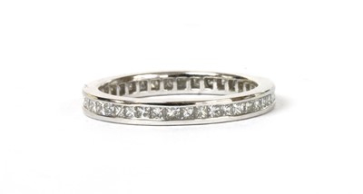 Lot 114 - A platinum princess cut diamond full eternity ring