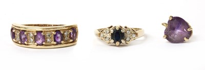 Lot 229 - A 9ct gold amethyst and diamond half hoop ring