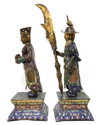 Lot 77 - A pair of Chinese cloisonné attendant figures
