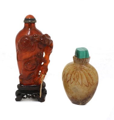 Lot 155 - A Chinese amber snuff bottle