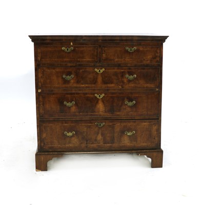 Lot 600 - An early 18th century walnut chest of drawers