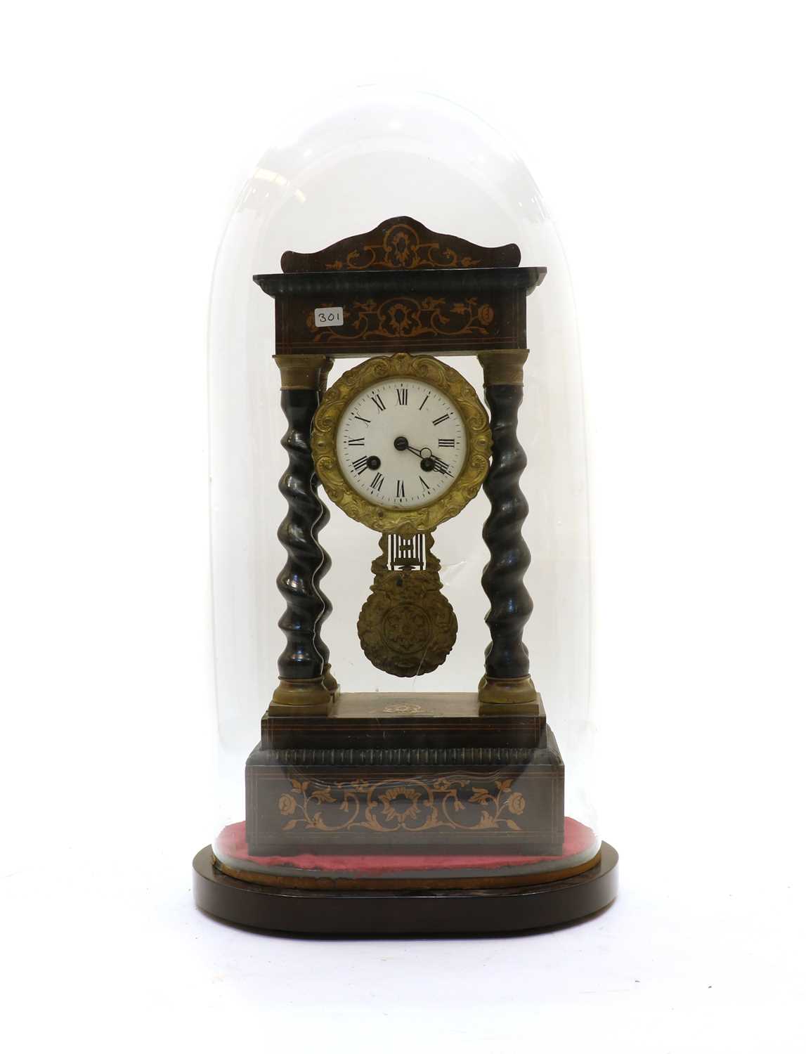Lot 163 - An ebonised and walnut inlaid portico clock