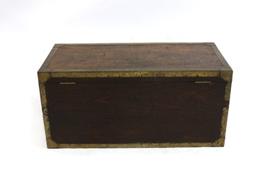 Lot 620 - A teak and brass bound trunk