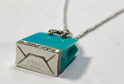 Lot 202 - A platinum turquoise and diamond shopping bag pendant/charm by Tiffany & Co.
