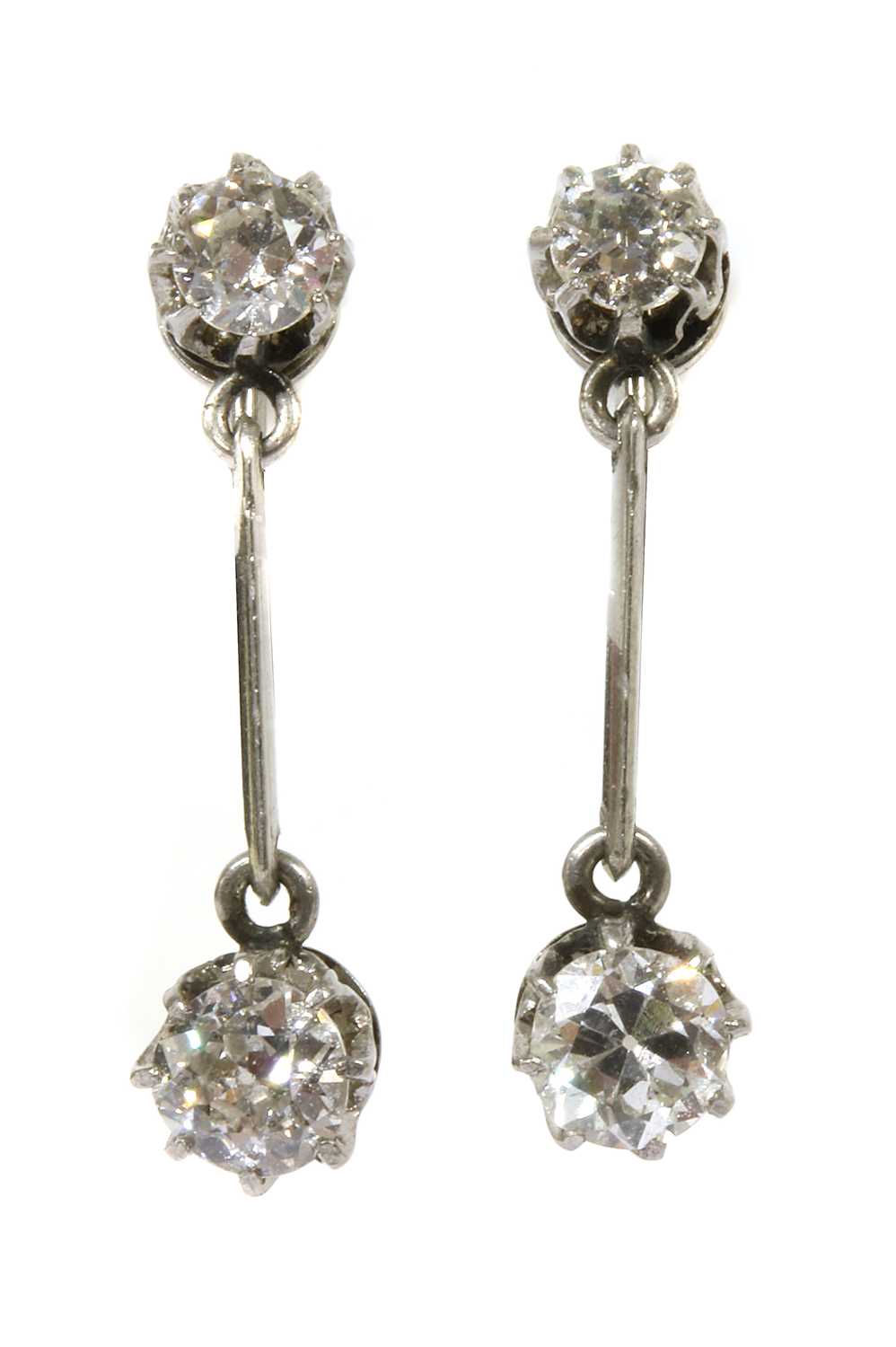 Lot 12 - A pair of early 20th century diamond drop earrings