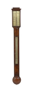 Lot 651 - A mahogany stick barometer